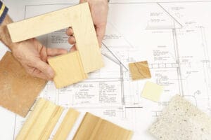 انتخاب متریال چوب و سنگ توسط معمار روی نقشه معماری ویلا